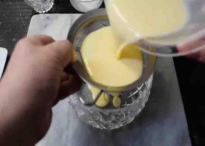 Sifting the custard for the tarts