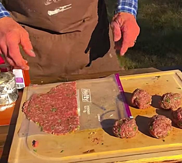 Make cowboy scotch eggs with sausage in a deep fryer