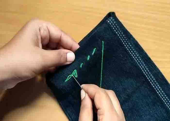 Stitching a hidden stitch to the fabric