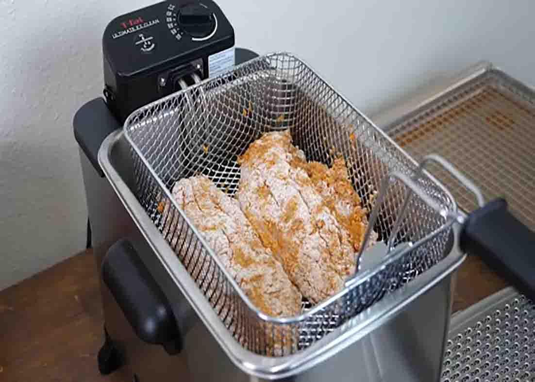 Deep-frying the catfish