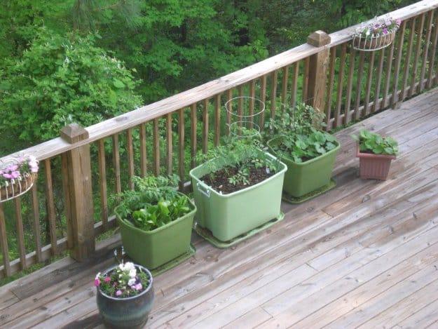 Rubbermaid Container Garden, a budget friendly way to dress up a flower bed and a clever outdoor decor idea anyone can build