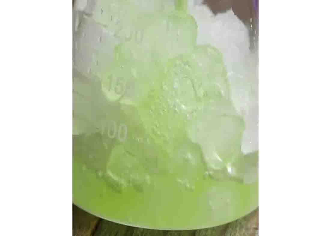 Sour apple concoction cocktail