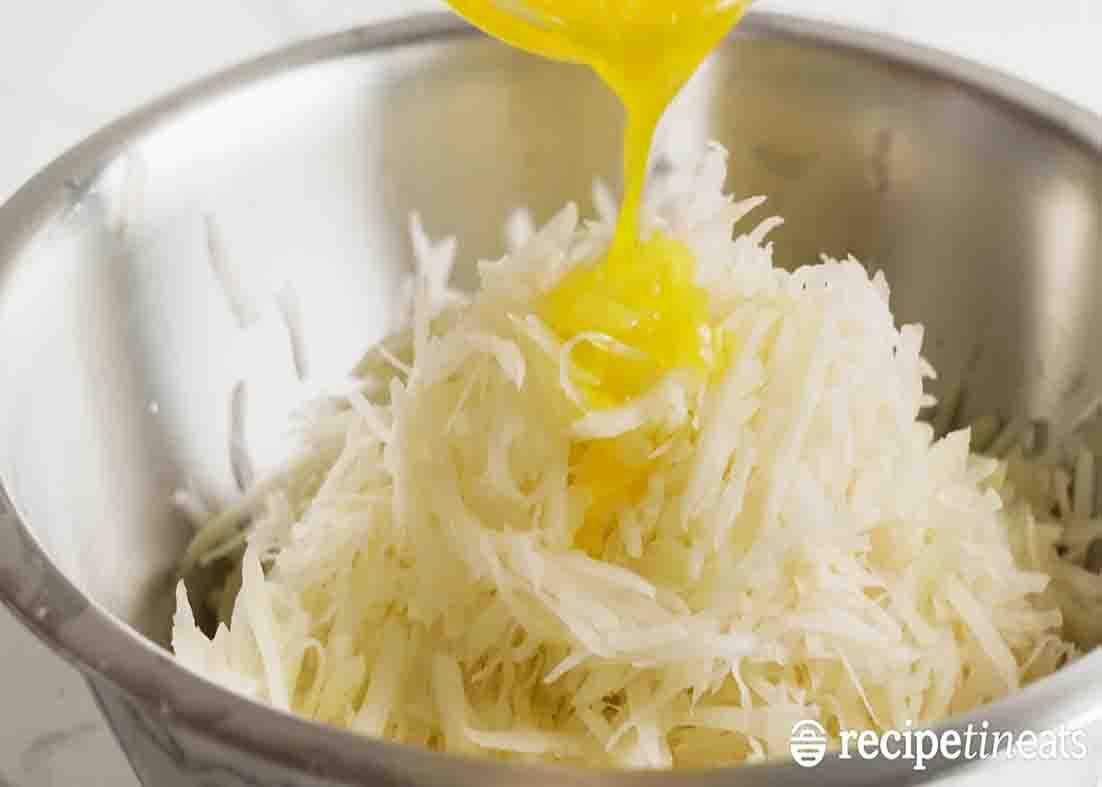 Mixing all the ingredients for the potato rosti recipe