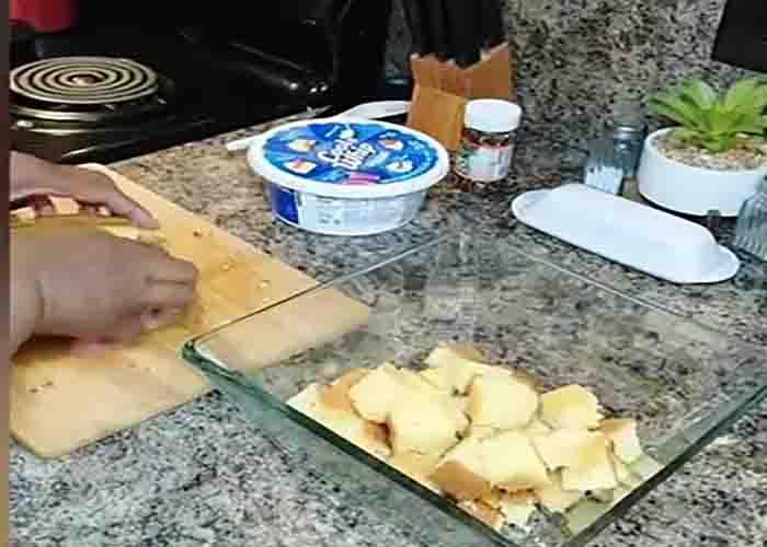 Making the first layer of strawberry punch bowl cake