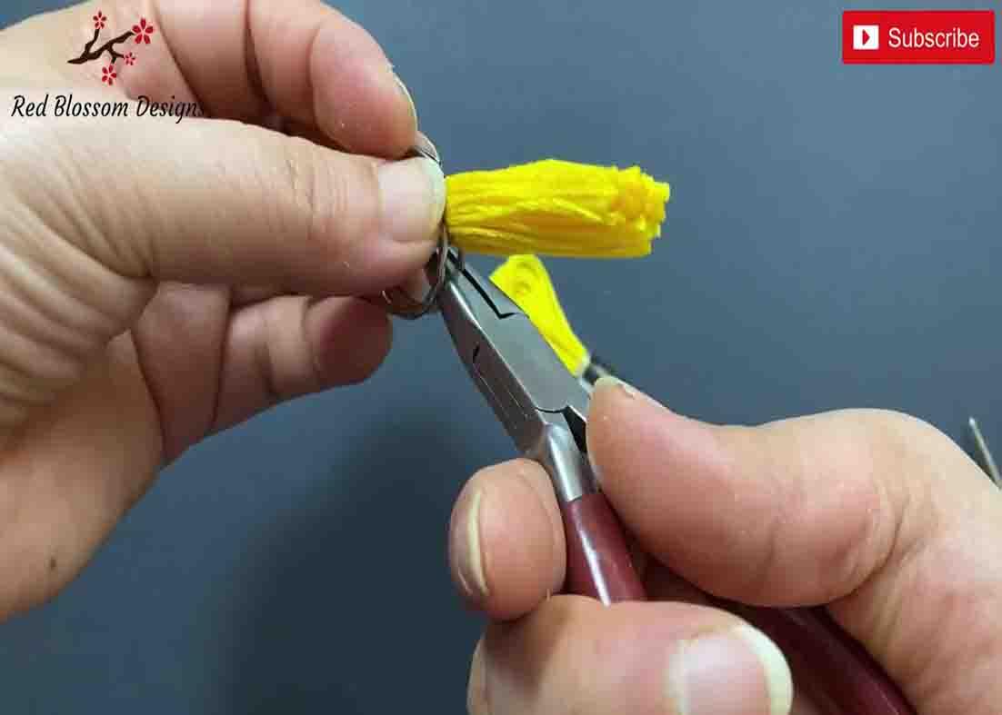Cutting the embroidery thread in half