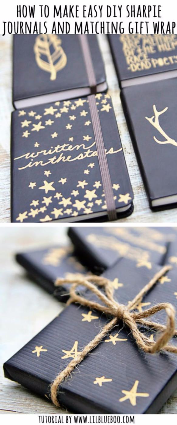 DIY sharpie journals, three navy notebooks drawn with gold stars and antlers beside black kraft paper and twine