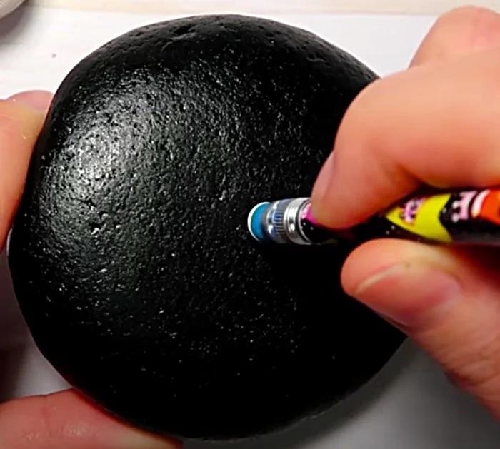 Make a mandala stone with craft paint