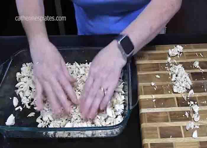 Layering the chicken au gratin casserole