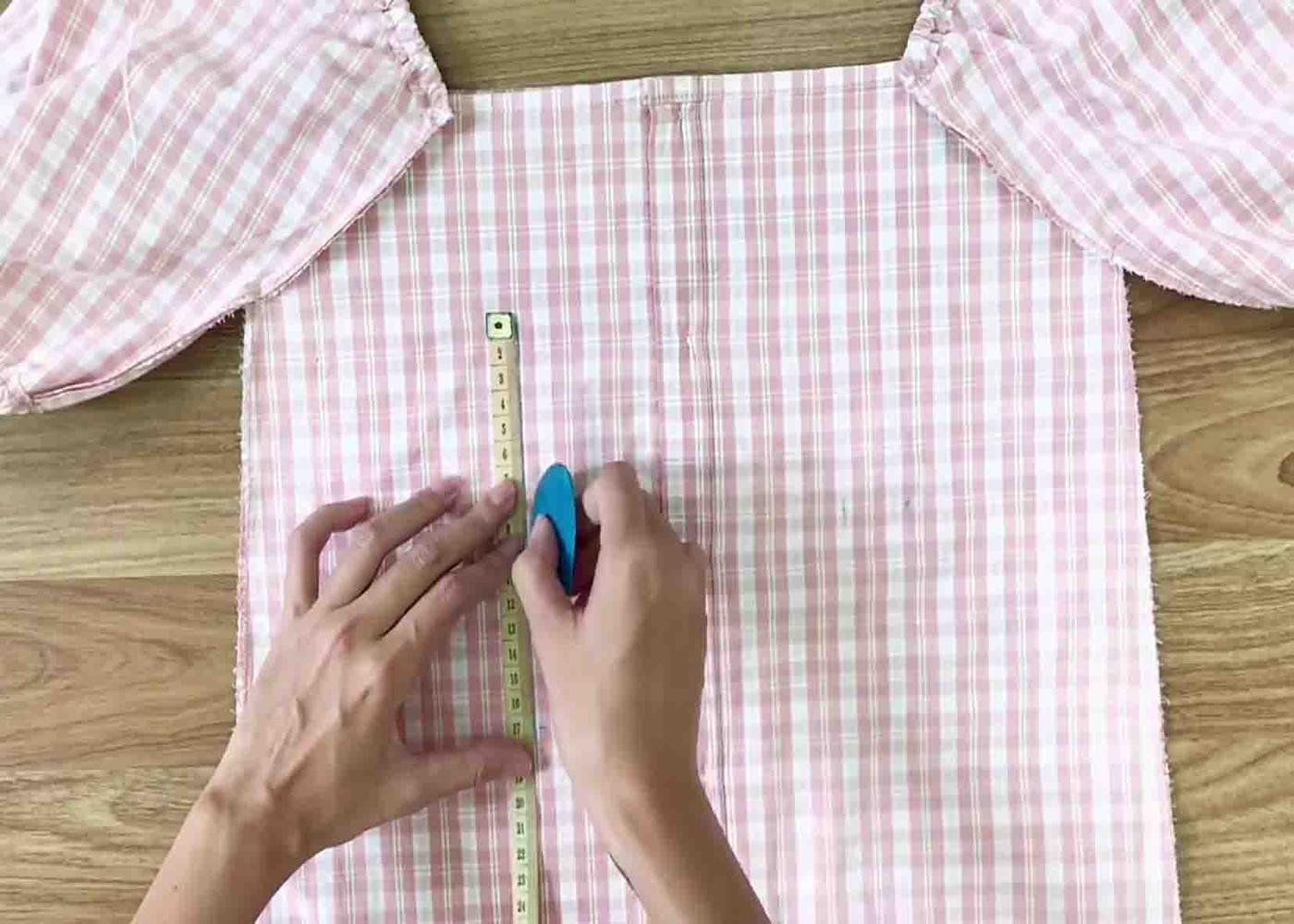 Fixing the measurents n both front and back of the dress
