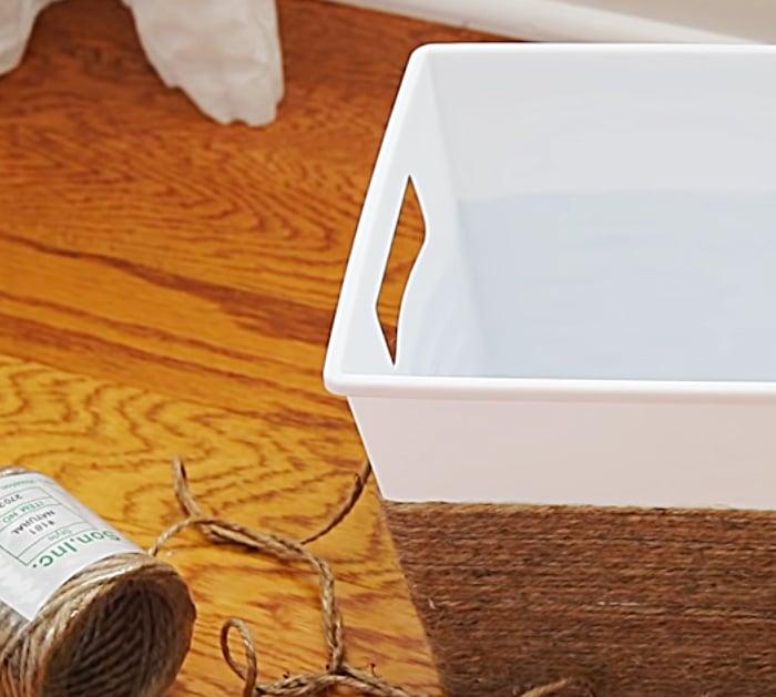 Try a new storage idea by make an easy quick cheap DIY storage basket with Dollar Tree Items