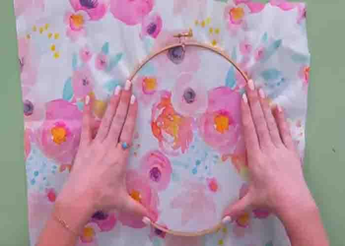 Adding the fabric to the embroidery hoop