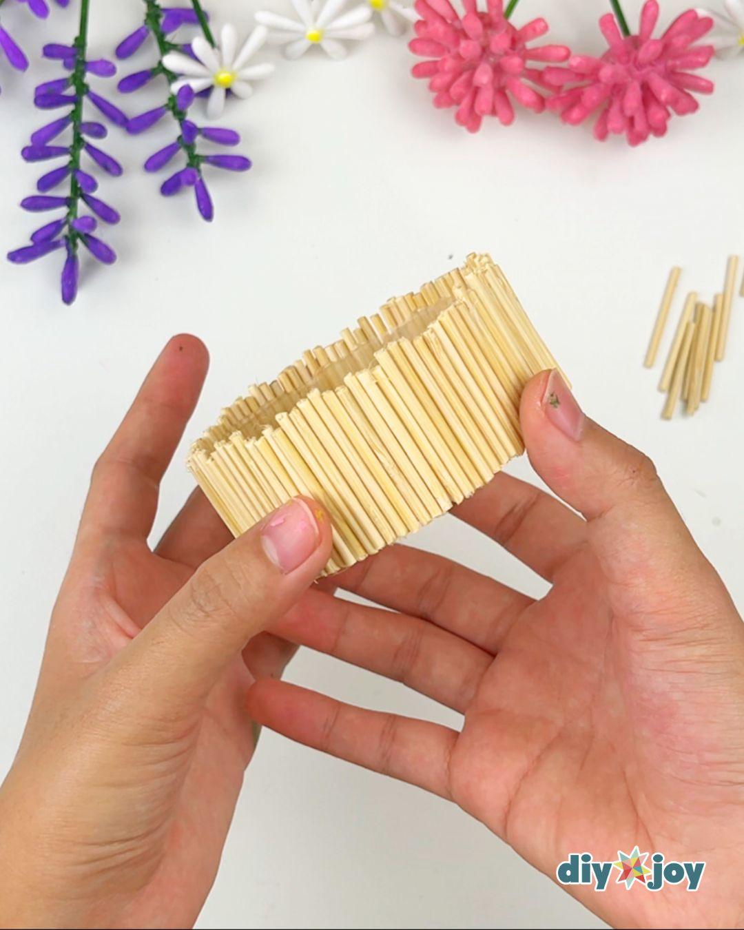 Homemade Q Tip Flower Bouquet — gluing the wood pieces