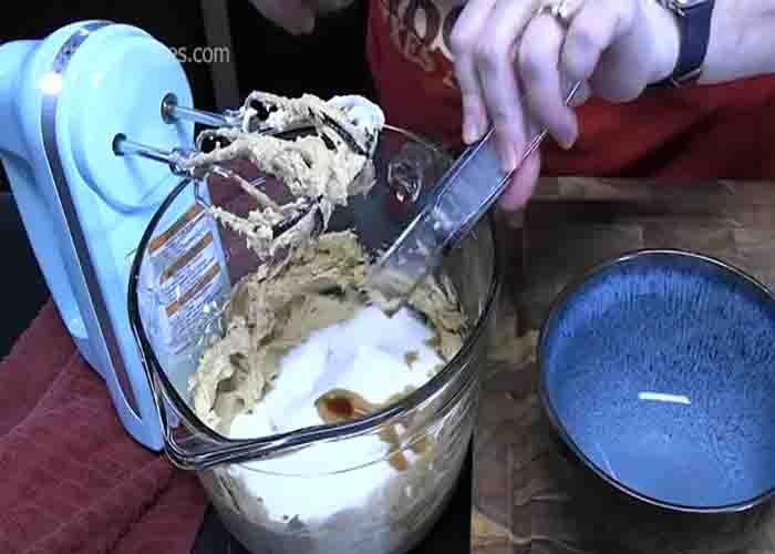 Making the cream cheese layer for the cookie butter dessert