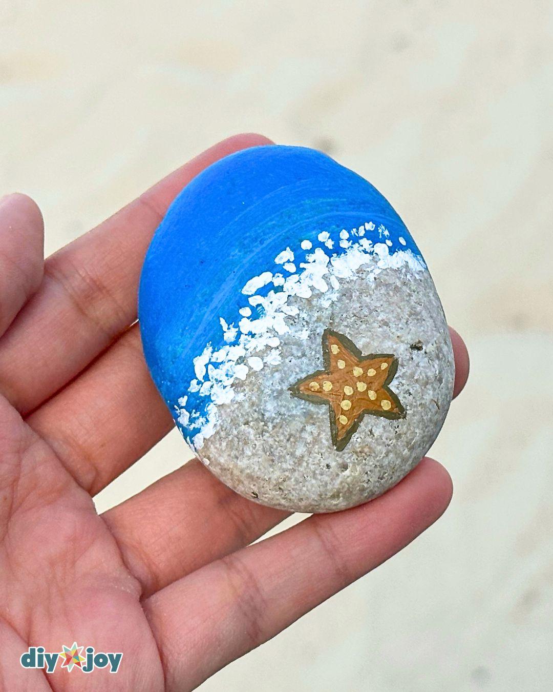 Painted Beach Rocks, a summer decor idea worth trying this season and a popular pick from this roundup