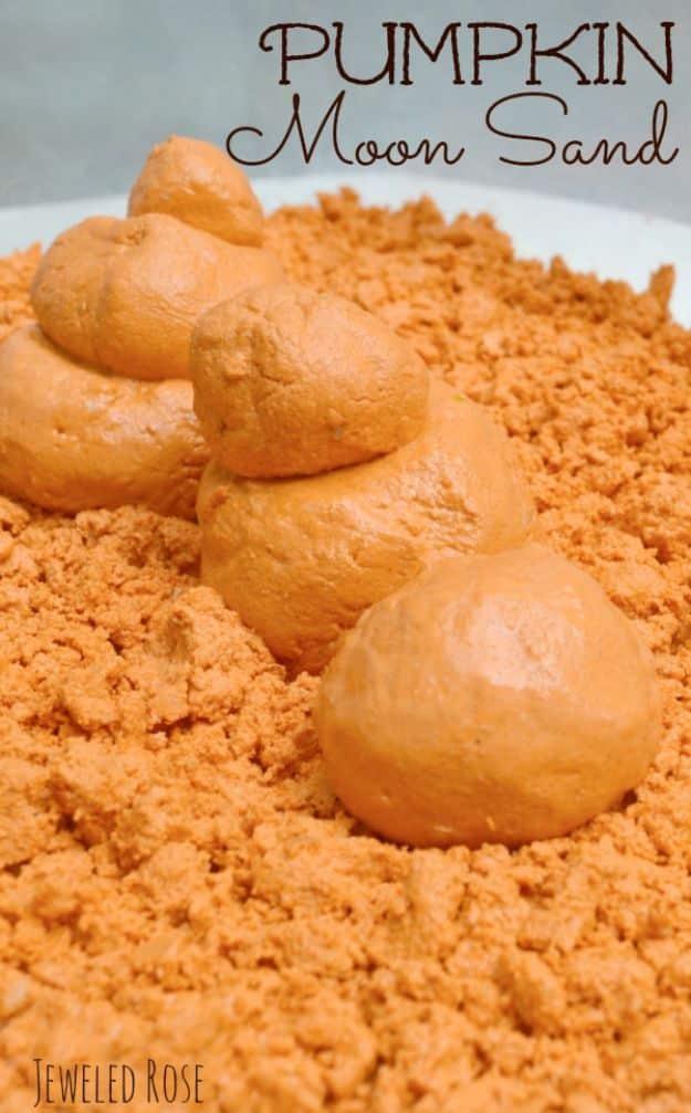 Pin graphic reading Pumpkin Moon Sand, orange moldable sensory sand packed into rounded pumpkin shaped mounds