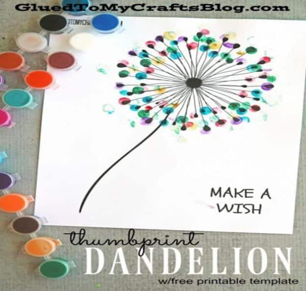 Printable dandelion with a black stem and thin spokes tipped with colorful thumbprints, beside paint dots