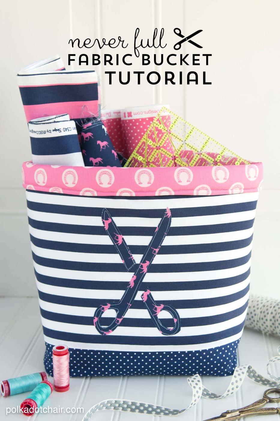 DIY fabric basket sewing project for the home, a navy striped storage bucket with a folded rim and scissors applique