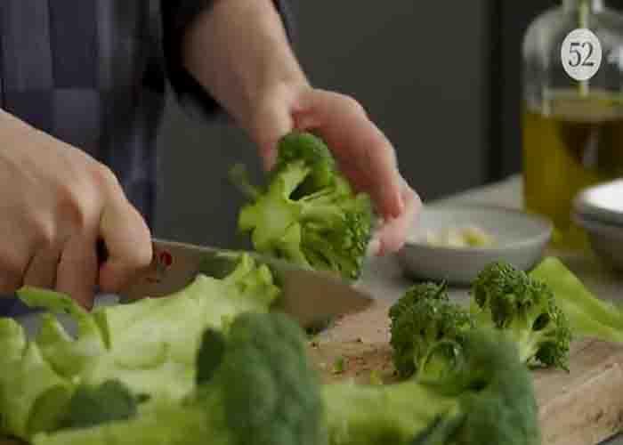 Chopping the broccoli before roasting