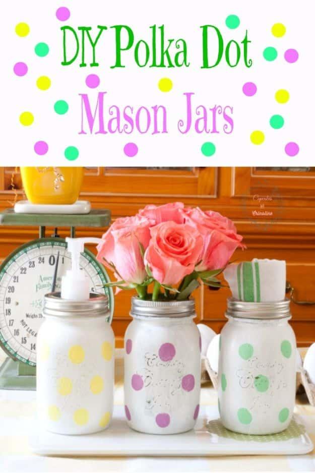 Pin graphic reading DIY Polka Dot Mason Jars, showing white painted jars with pastel dots holding pink roses