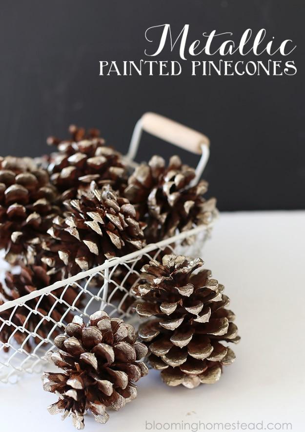 Metallic painted pinecones in gold and silver piled into a mesh basket as easy DIY Thanksgiving decor