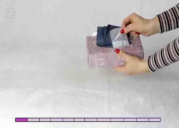 Turning an empty tissue box into a trash bag dispenser