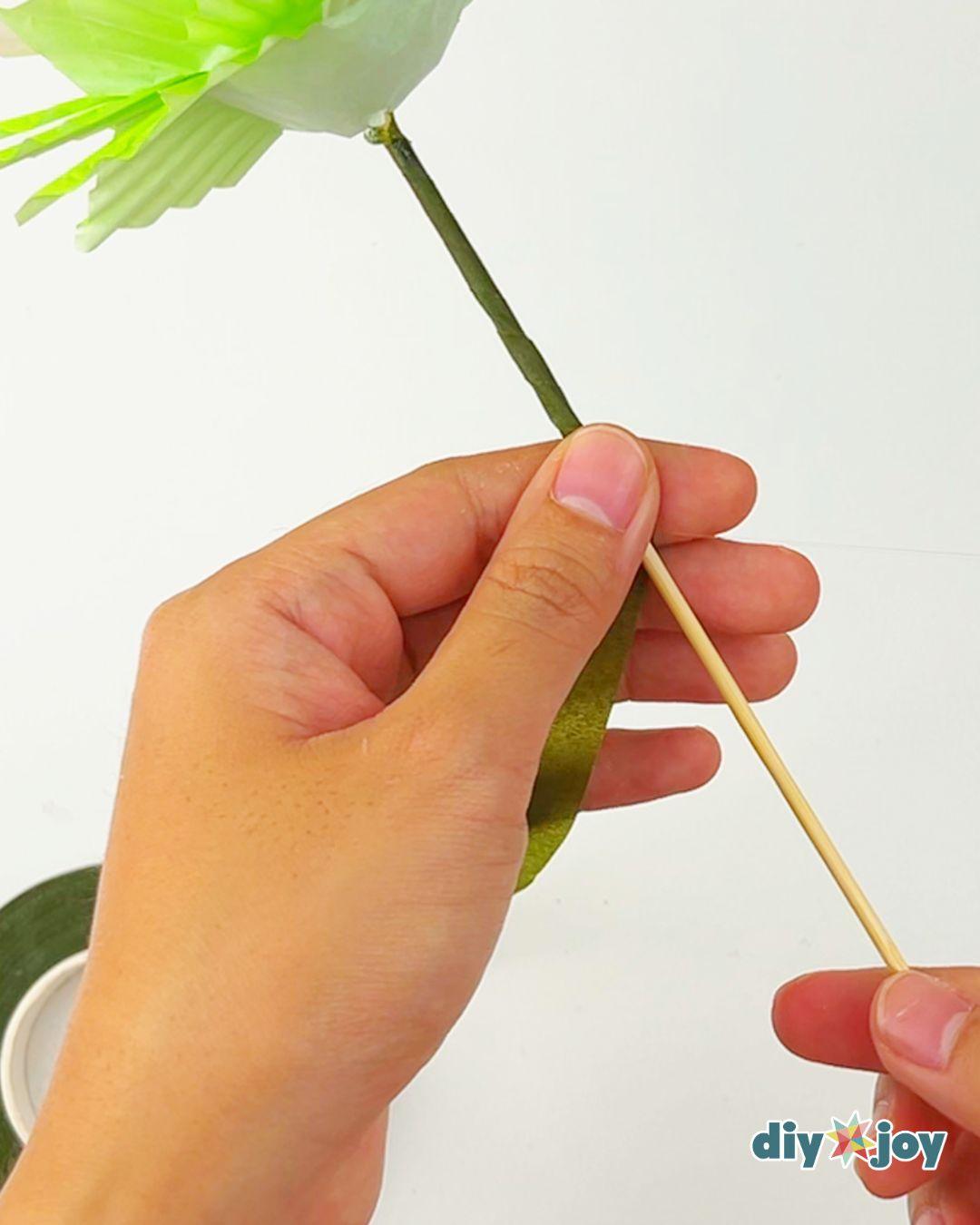 Homemade Paper Flower Bouquet Using Cupcake Liners — covering the stem