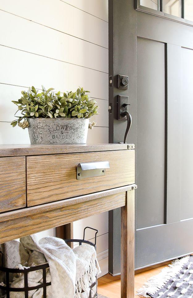 Aged Inexpensive Galvanized Planters, a budget living room decor idea that looks far pricier than it is