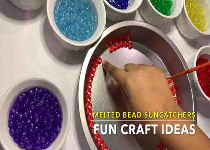 Laying the beads to the baking pan to make the suncatcher