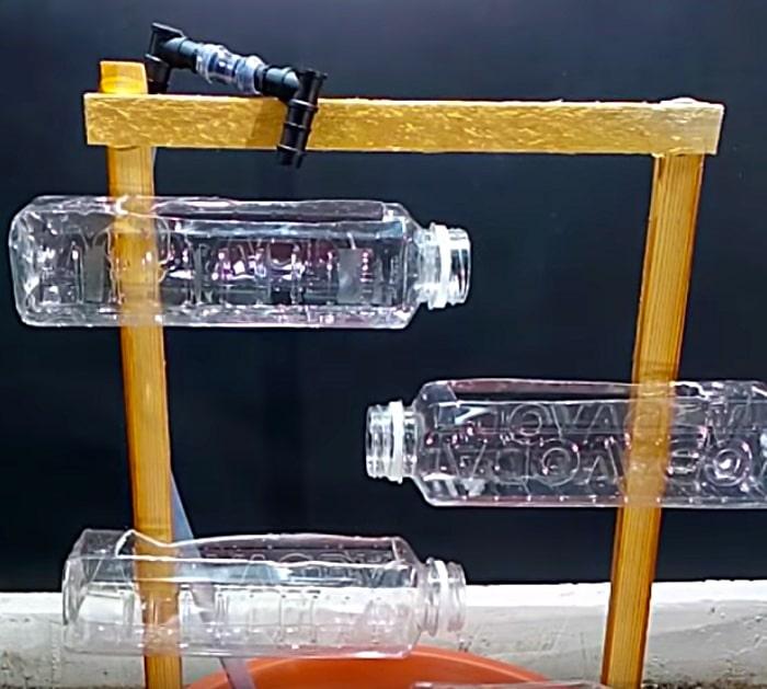 Make a fountain out of old water bottles