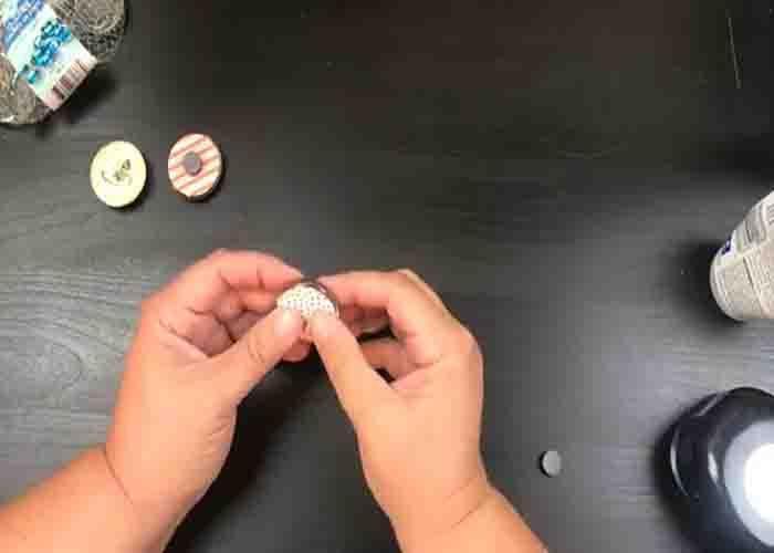 Sticking the design to the glass gem