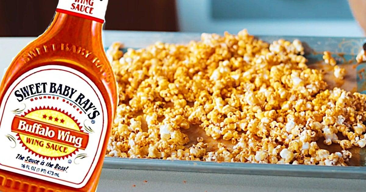 Caramelized spicy buffalo popcorn coated in a hot sweet glaze in a bowl, an easy movie night snack recipe