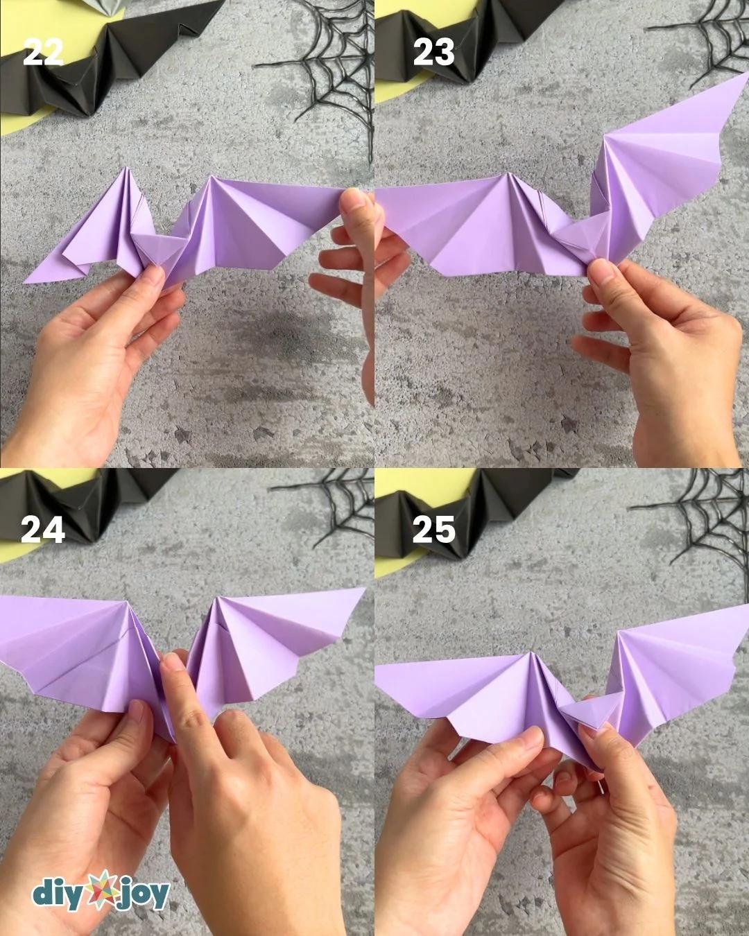 How to make a paper bat, step 8 folding the right side in, a no-glue Halloween craft for kids and preschoolers.