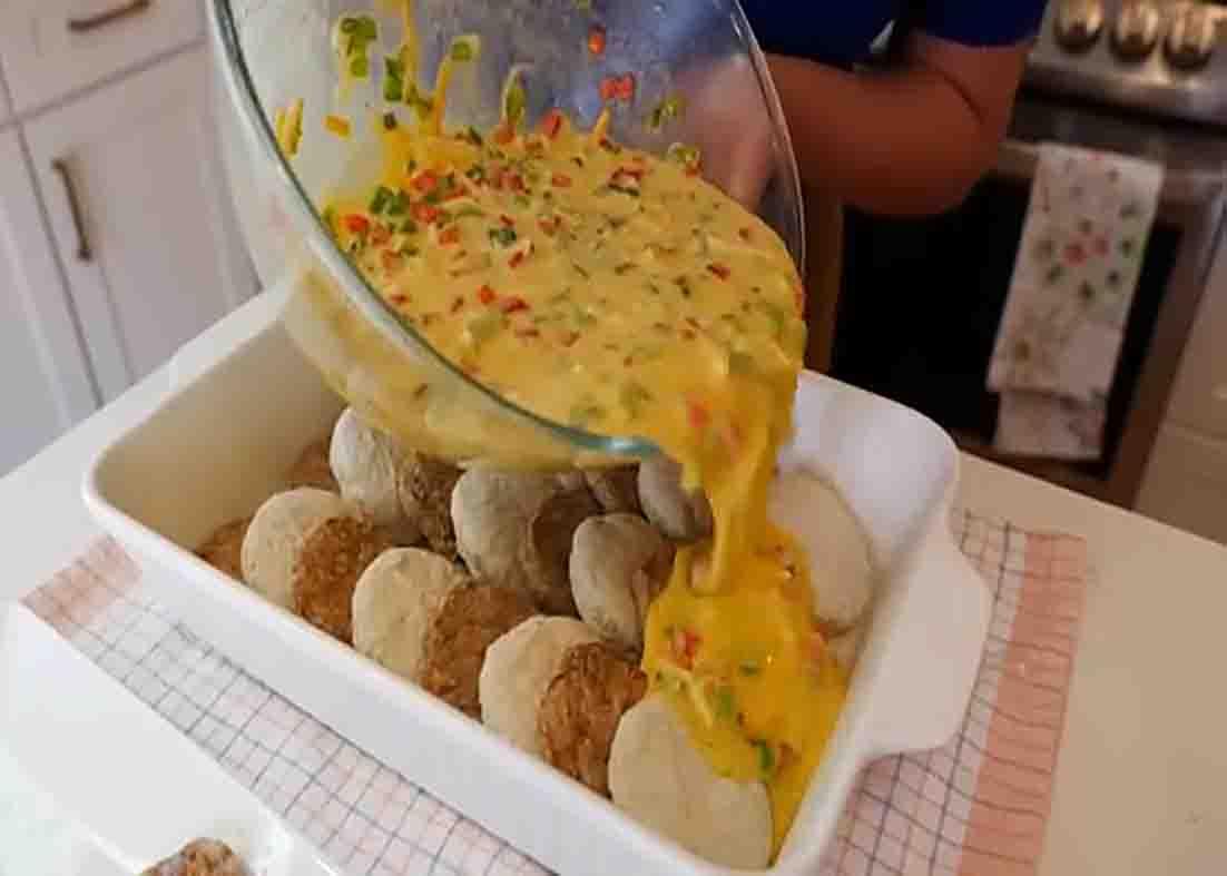 Assembling the sausage breakfast casserole