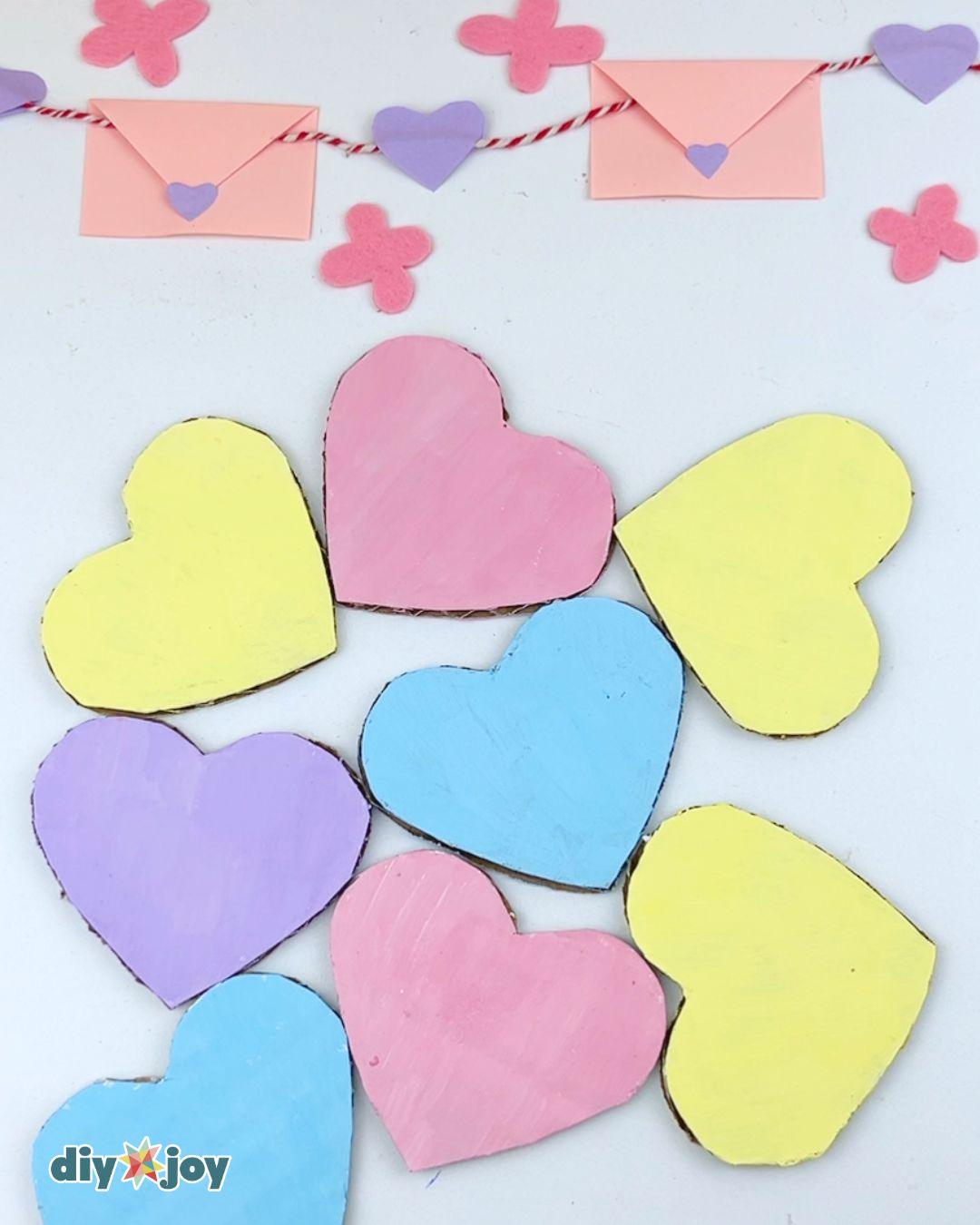 Easy Cardboard Conversation Hearts Valentines Decor — large-cardboard-hearts