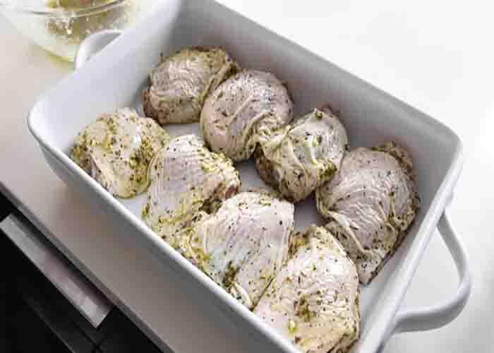 Assembling the Greek lemon chicken casserole recipe