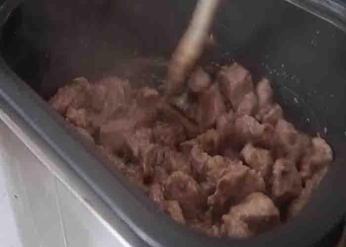 Sauteing the beef and pork meat