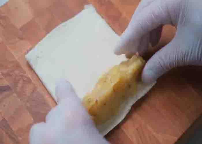 Making the banana roll French toast