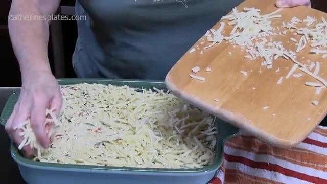 Assembling the monterey chicken and spaghetti casserole