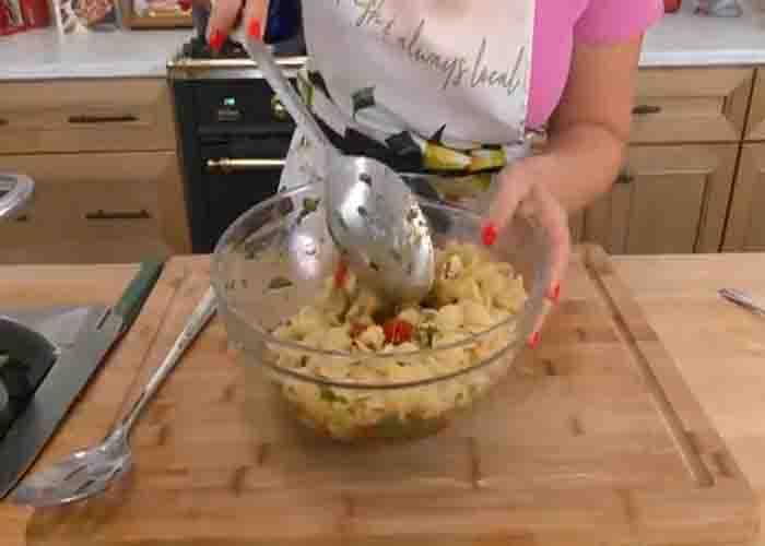 Assembling the caprese pasta salad