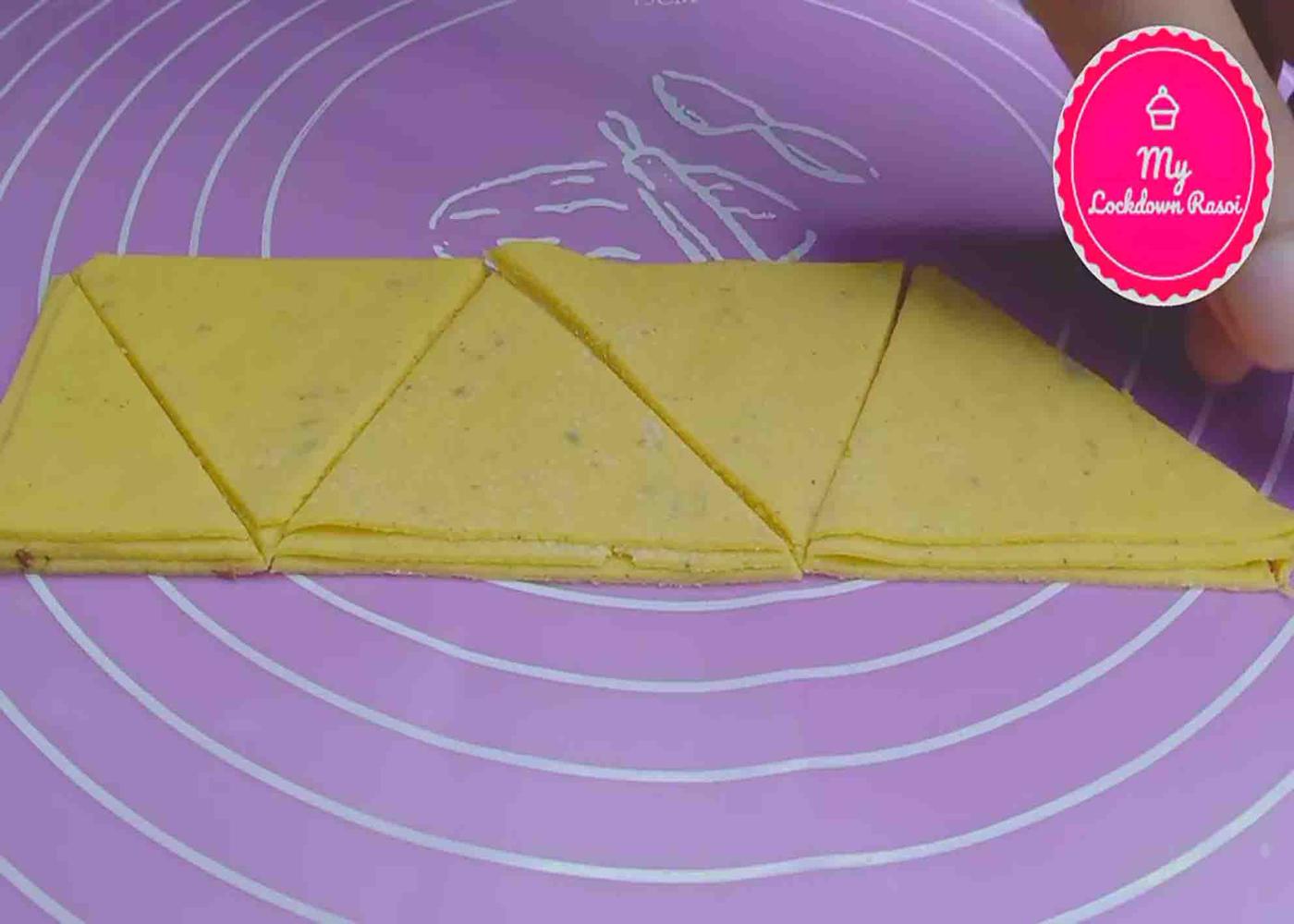 Cutting the dough into triangle