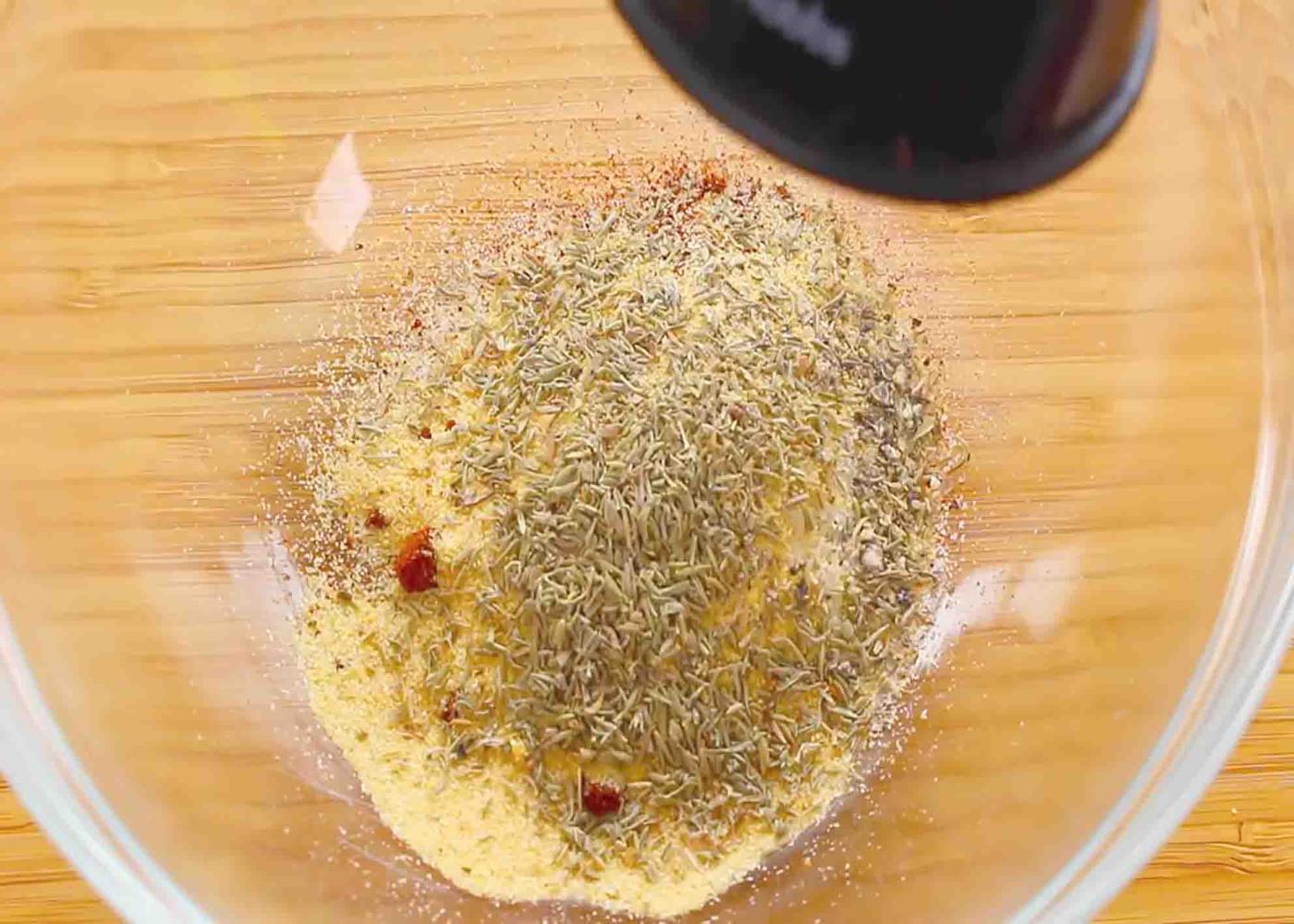 Mixing all the spices to be used for the crock pot whole chicken recipe