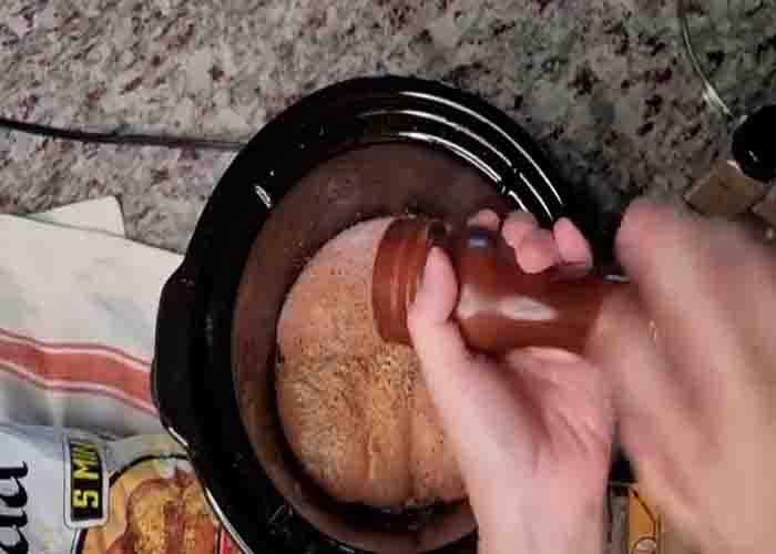 Seasoning the chicken for the crockpot chicken dinner recipe