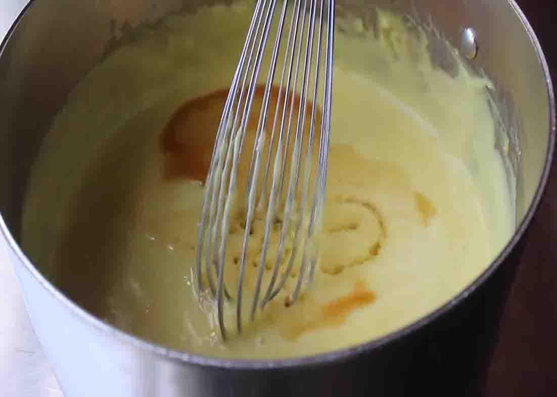 Mixing the ingredients to make the pudding for the baked banana pudding