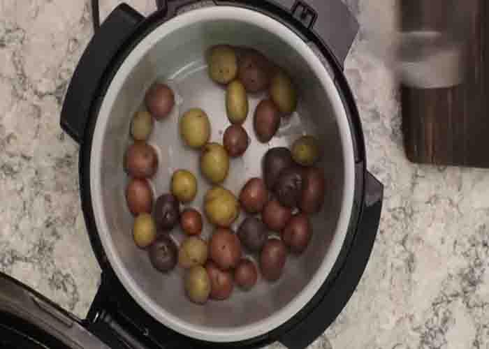 Air frying the potatoes