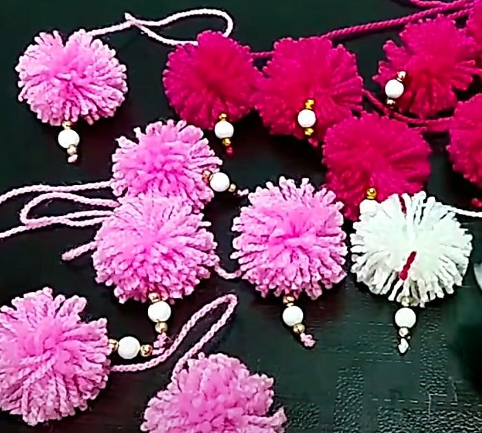 Make a hanging chandelier fixture using yarn and floral wire