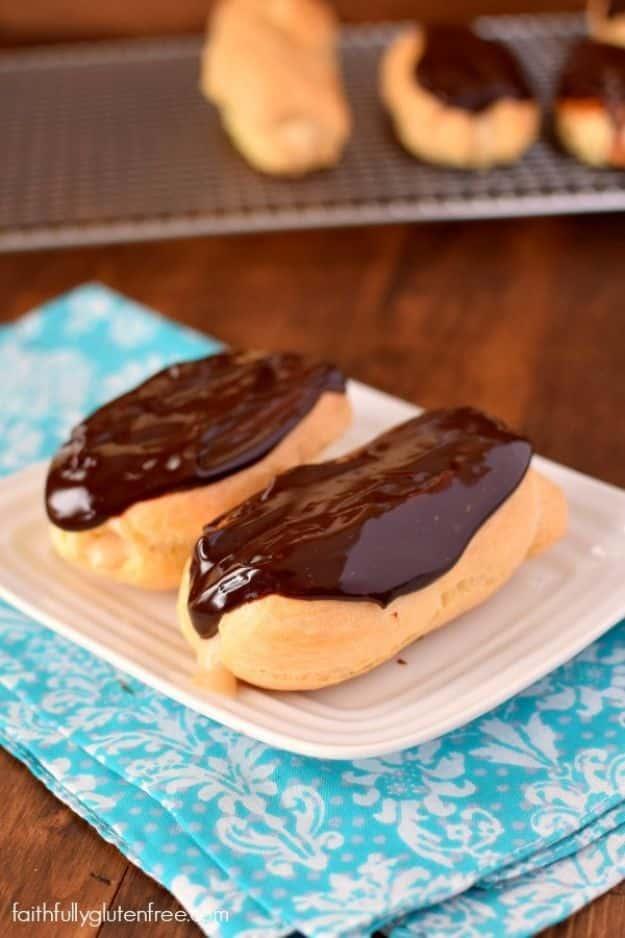 Gluten free eclairs filled with peanut butter pastry cream and topped with a glossy dark chocolate glaze