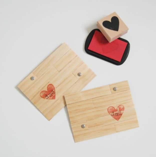Two wood veneer Father's Day cards built from pallet style strips with brad screws and a red stamped heart
