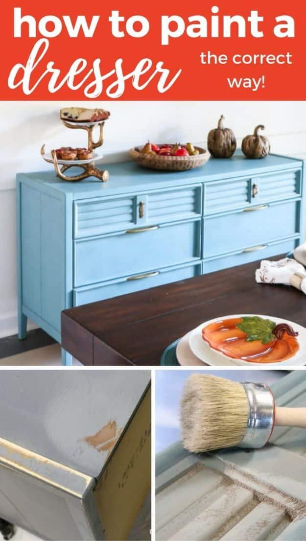 Painting hack for dressers, a mid century dresser painted soft blue with a close up of a wax brush on the drawers