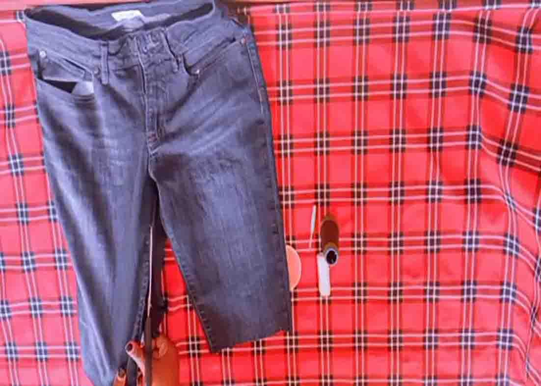 Cutting the jeans' seams open