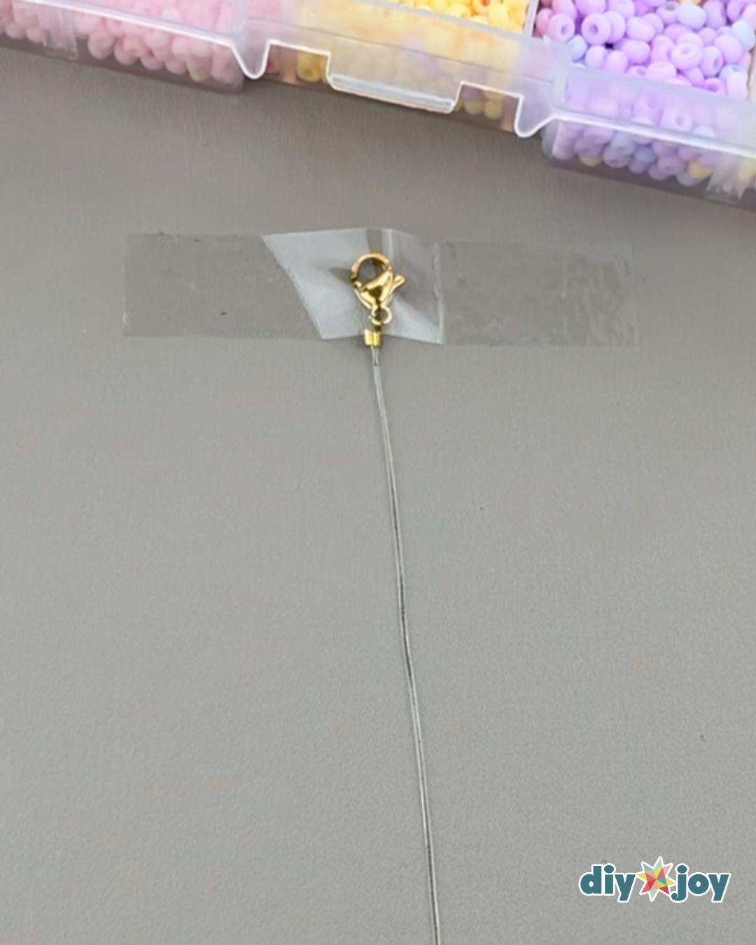 Cherry Bracelet — taping the bracelet